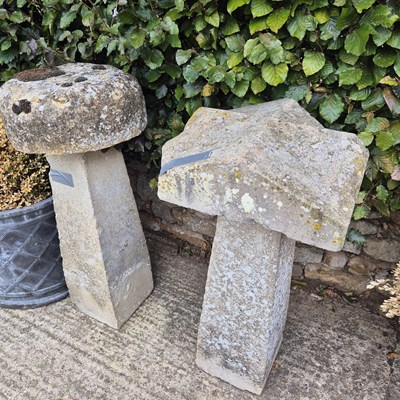 Lot 1086a - Two staddle stones with associated caps