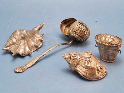 Lot 131 - Four antique white metal small shell form...