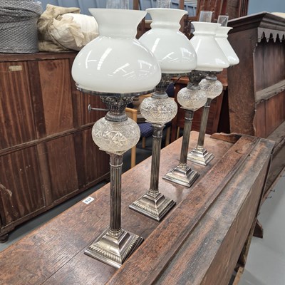 Lot 1038 - A set of four late 19th-century silver-plated...