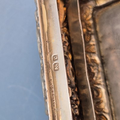 Lot 1058 - A hallmarked silver baby's rattle, dated 1905,...