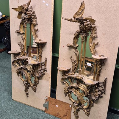 Lot 1056 - An impressive pair of antique carved giltwood...