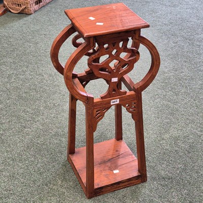 Lot 1065 - An Art Nouveau style carved hardwood stand 40...