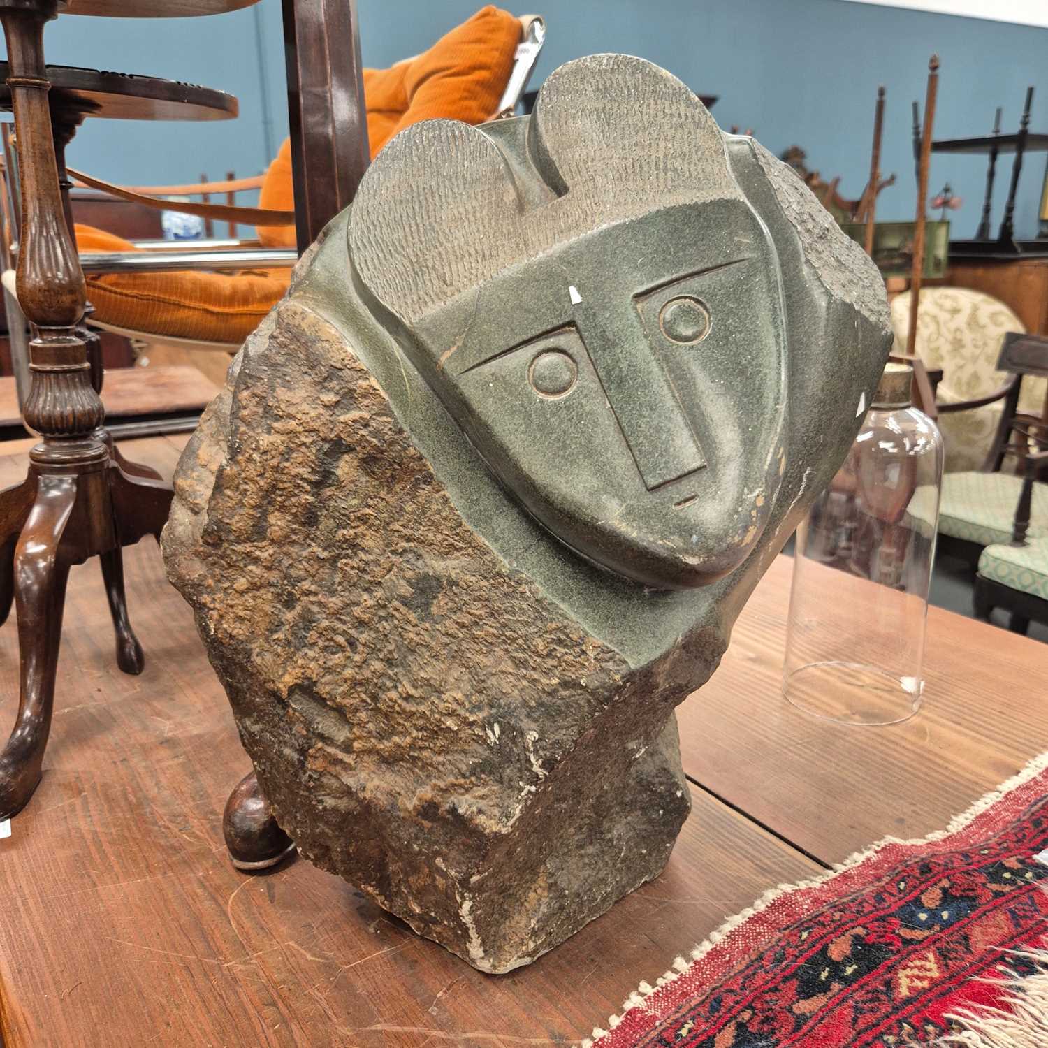 Lot 1066 - An African large carved hardstone sculpture.