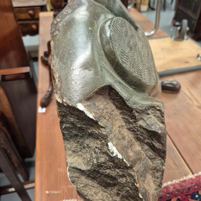 Lot 1066 - An African large carved hardstone sculpture.