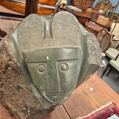 Lot 1066 - An African large carved hardstone sculpture.