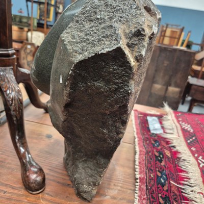 Lot 1066 - An African large carved hardstone sculpture.