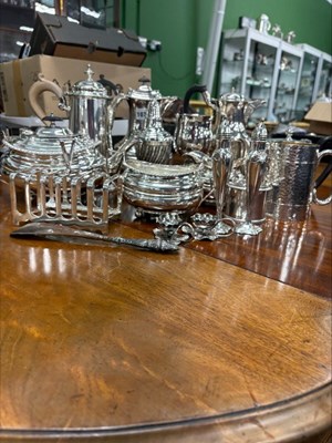 Lot 1075 - A vintage silver-plated four-piece tea set, a...