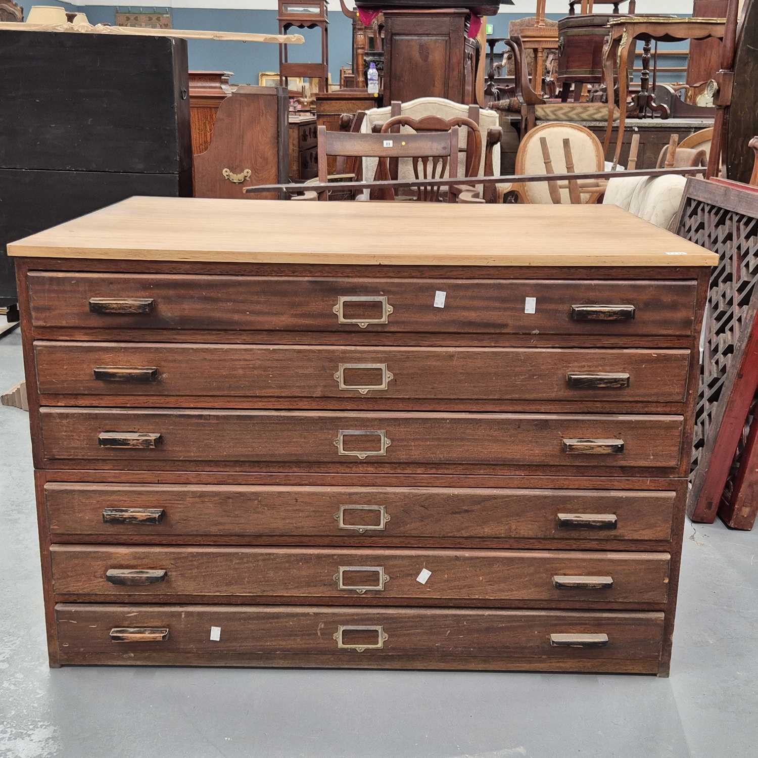 Lot 1136 - A Vintage two part six drawer plan chest.