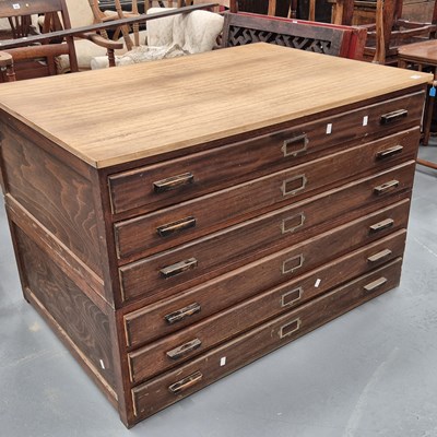 Lot 1136 - A Vintage two part six drawer plan chest.