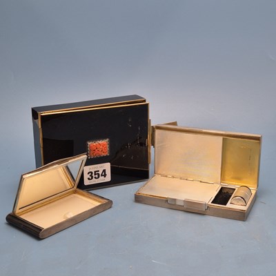 Lot 354 - Three art deco and later ladies' compacts,...