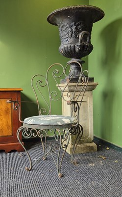 Lot 260a - A 20th-century wrought iron set of four garden...