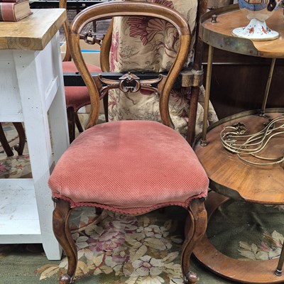 Lot 1217 - A set of six Victorian balloon-back side chairs.