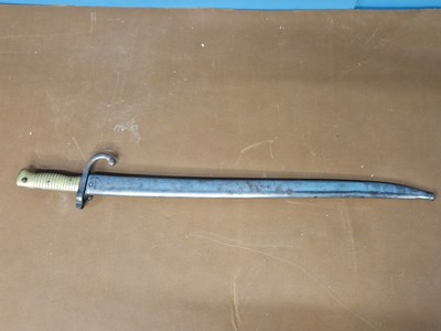 Lot 251 - A French 1871 model bayonet in an iron scabbard