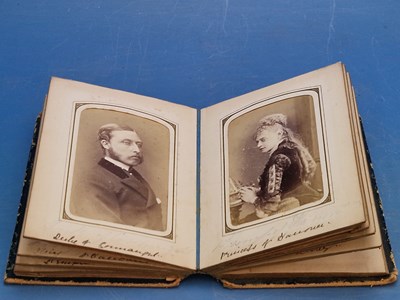 Lot 261 - A mid Victorian album of nineteen photographic...