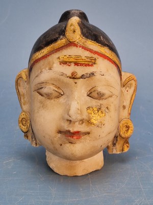 Lot 271 - An Indian marble head of a lady detailed in...