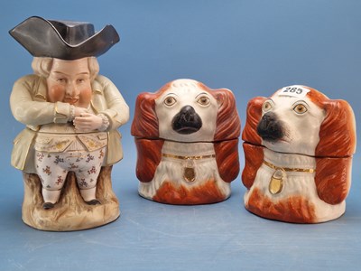 Lot 285 - A pair of Staffordshire pottery spaniel head...
