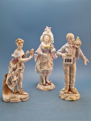 Lot 288 - A pair of German porcelain figures holding...