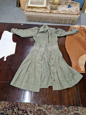 Lot 299 - A suitcase containing a lady's grey wool...