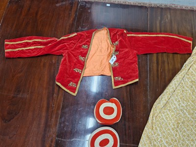 Lot 303 - A gold thread on white caftan, a red velvet...