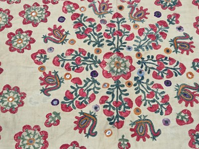 Lot 306 - An Indian brown textile panel embroidered with...