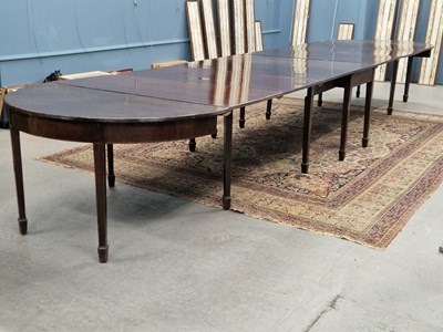 Lot 323 - A 19th century mahogany D-end dining table...