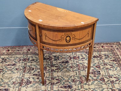 Lot 338 - A rosewood cross banded satinwood table, the...