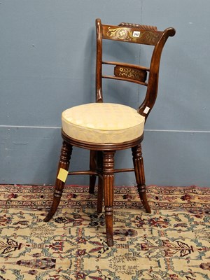 Lot 340 - A Regency rosewood piano stool, the brass...