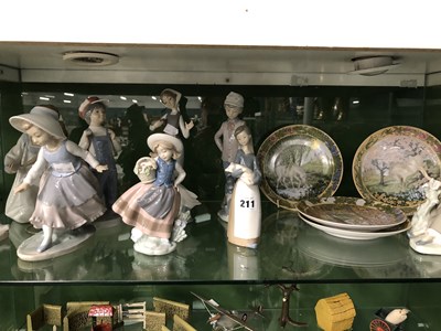 Lot 211 - Nine Lladro and Nao figures together with four...