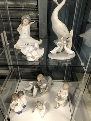 Lot 237 - Eight Lladro and Nao figurines
