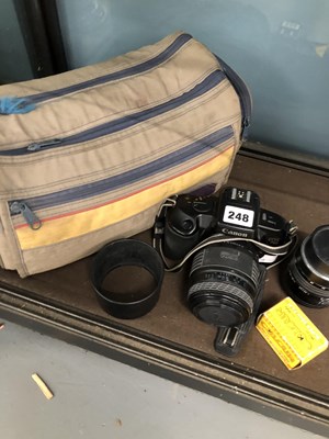Lot 248 - A Canon EOS 750 camera, lenses and carrying bag