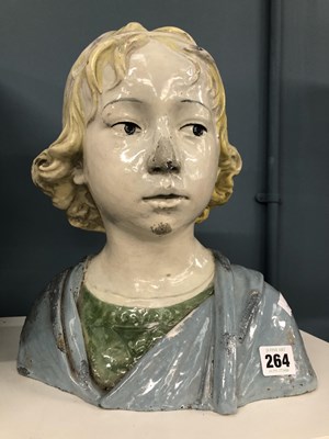 Lot 264 - A Della Robbia style pottery bust of a blond...