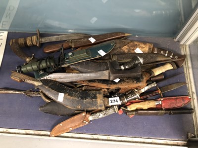 Lot 274 - A collection of kukris and other knives, some...