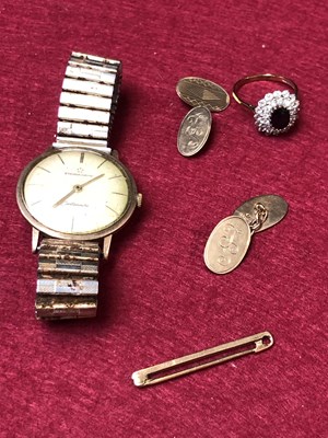 Lot 114 - A 9ct hallmarked gold, sapphire and cz cluster...