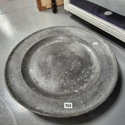 Lot 752 - A large antique pewter charger.