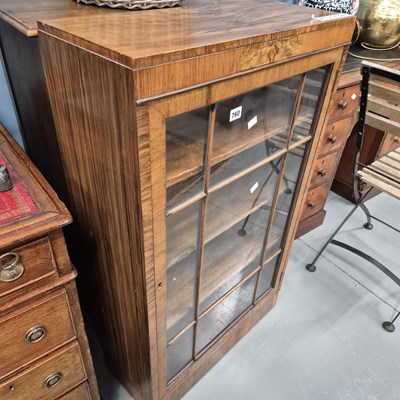 Lot 760 - An Art Deco walnut glazed small bookcase.