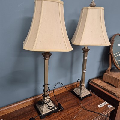 Lot 766 - A pair of table lamps with shades.