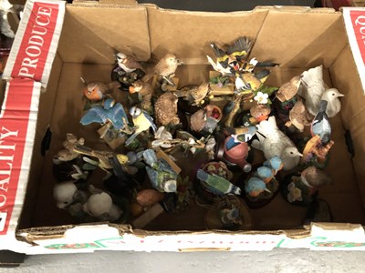 Lot 327 - A collection of bird, dog and animal figurines