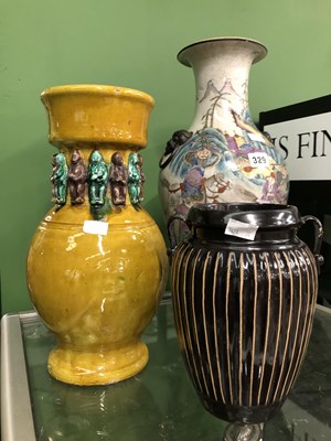 Lot 329 - A Canton baluster vase, a Chinese yellow...