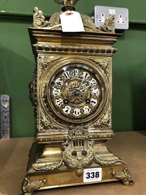 Lot 338 - An eagle crested brass mantle clock striking...