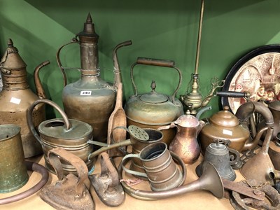 Lot 340 - Copper wares: ewers, kettles, a bugle, two...