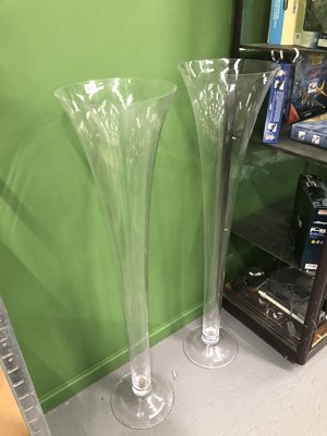 Lot 343 - A pair of tall trumpet shaped clear glass...