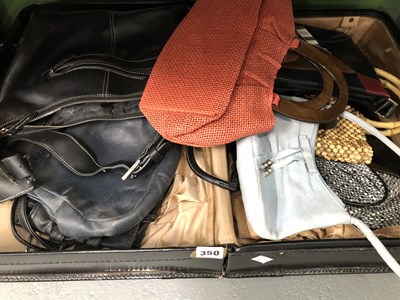 Lot 350 - A folding case containing a selection of handbags