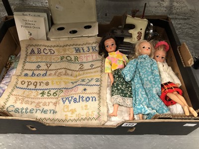Lot 372 - Three dolls, a child's sewing machine, Beatrix...