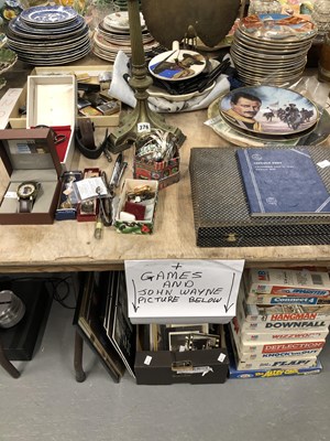 Lot 376 - John Wayne plates, photographs and other...