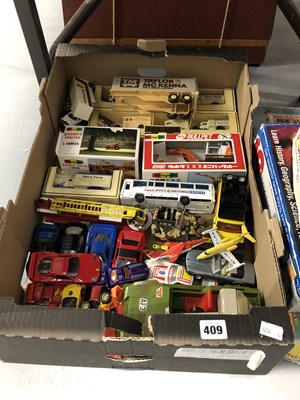 Lot 409 - Die cast and plastic toy vehicles, children's...