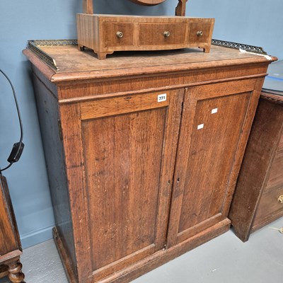 Lot 771 - A Victorian oak two-door side cabinet with...