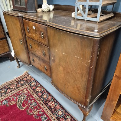 Lot 778 - A vintage walnut sideboard.
