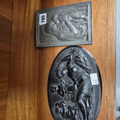 Lot 780 - Two antique relief-decorated plaques.