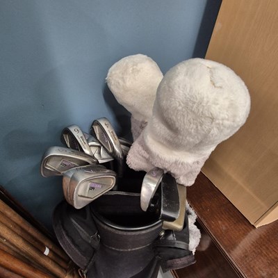 Lot 791 - A set of wilson golf clubs.