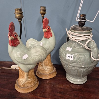 Lot 797 - Three oriental celedon glazed lamps.